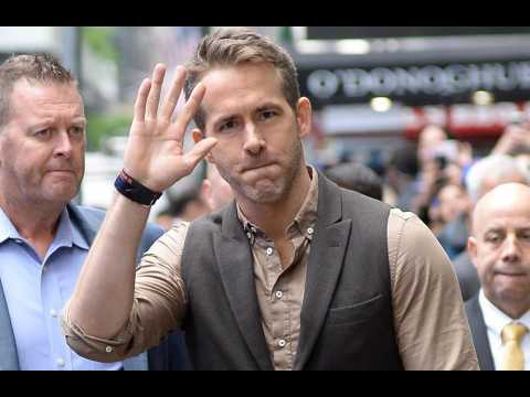 Ryan Reynolds almost trampled by passionate fans at convention