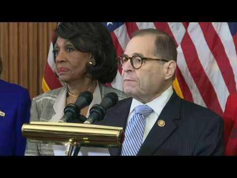 House announces two impeachment charges against Trump