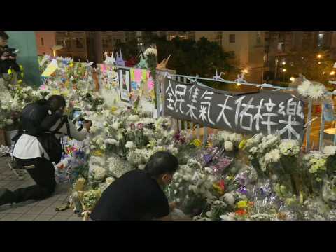 Vigil in Hong Kong for student who died after fall during clashes between police and protesters