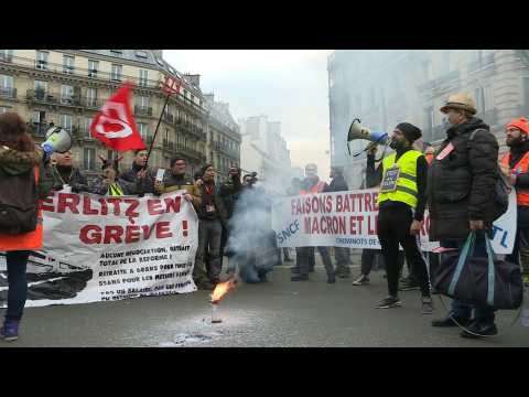 Protesters march in Paris against pension reform