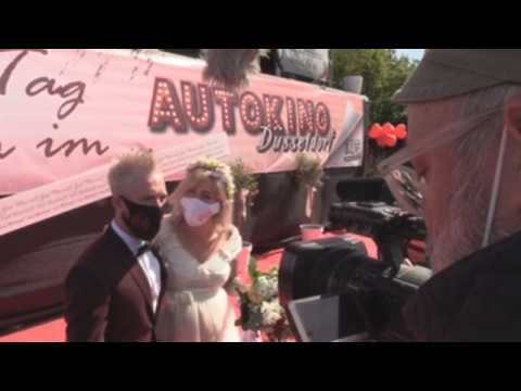 Couple gets married at a drive-in cinema in Germany