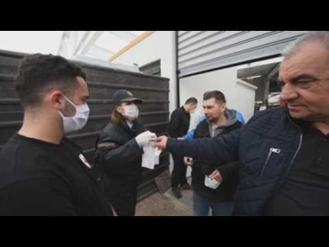 North Macedonian police hand out masks
