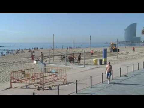 Residents enjoy the sunshine as beaches reopened in Barcelona
