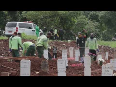 Mass grave for coronavirus victims in Indonesia