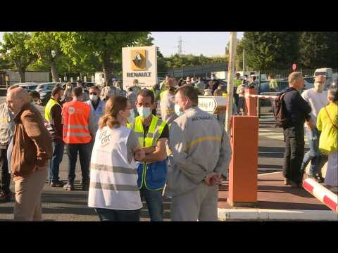 Renault employees gather at plant after news of jobs cuts