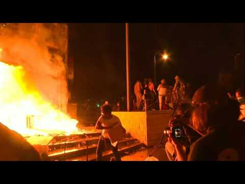 Protesters set Minneapolis police station on fire