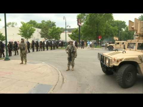 National Guard deployed to Minneapolis stand guard after violent protests overnight