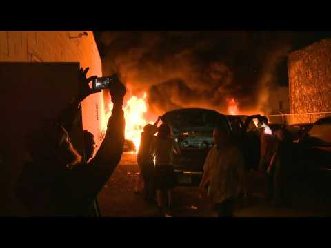 Cars set ablaze in Minneapolis as protesters ignore curfew orders