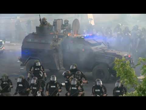 Law enforcement use tear gas to clear out protesters in Minneapolis