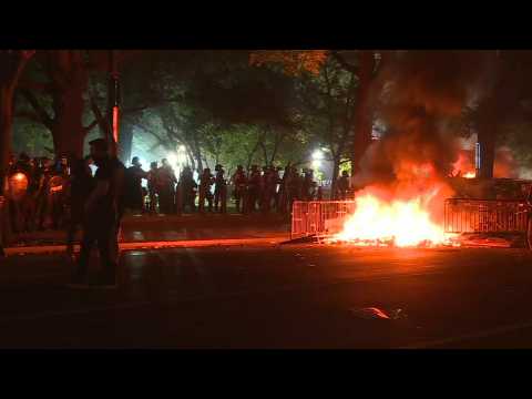 US protesters light fires near White House