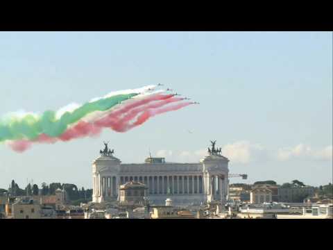 Military jets fly over Rome releasing colours of the Italian flag on Republic Day