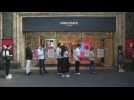 Long queues as shop reopens in Paris