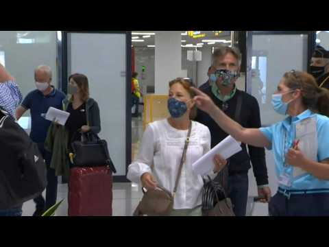 German tourists arrive in Palma de Mallorca as travel resumes
