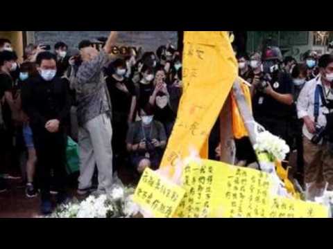 Hong Kong activists commemorate death of protester