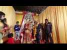 Weddings resume in India under strict measures