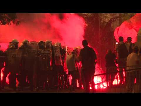 Protesters throw firecrackers at police in Belgrade protest