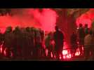 Protesters throw firecrackers at police in Belgrade protest