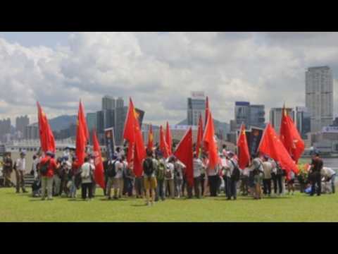 Pro-China protesters celebrate passage of controversial national security law in Hong Kong