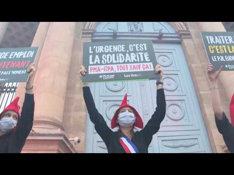 Costumed protesters rally against bioethics bill in Paris