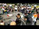 Brazilians recreate George Floyd death during protest against Bolsonaro