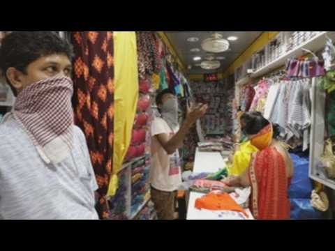 Kolkata businesses start reopening after gov't eases lockdown