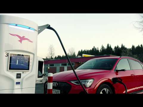 The new Audi e-tron Sportback in Catalunya red Charging demo