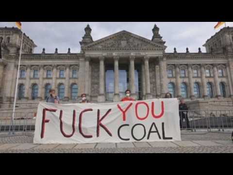 Environmentalists protest against Germany's coal phase-out law