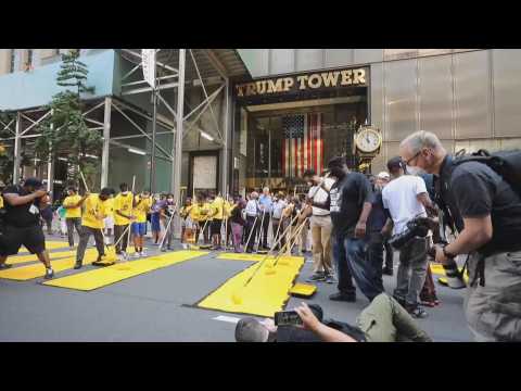 New Yorkers paint a mural for Black Lives Matter in front of the Trump Tower