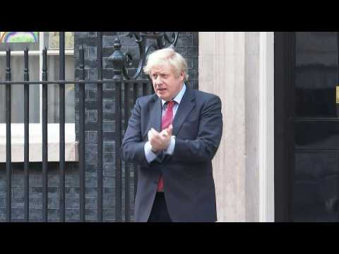 British PM Boris Johnson joins 'Clap for Carers' tribute on Downing Street