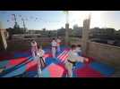Palestinian karate coach holds training session on rooftop due to pandemic