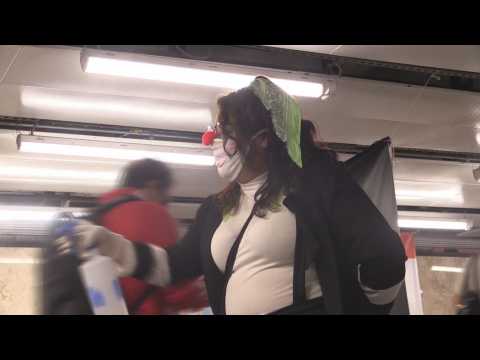 Mexican clowns give their best face by raising awareness about a pandemic in the subway