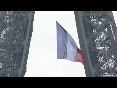 Large French flag hangs from Eiffel Tower to mark 75 years since end of World War II