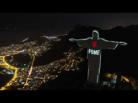Brazil's most iconic landmark lit up with calls to end hunger