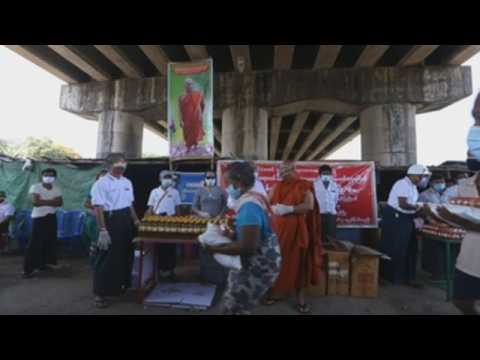 People in Yangon receive food donations amid coronavirus pandemic