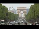 Traffic returns to Paris' Avenue du Champs-Élysées