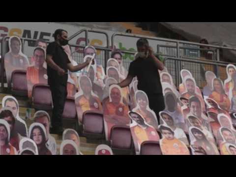 Galatasaray’s fans return to stadium as 2D cut-outs