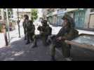 Israeli soldiers arrest Palestinian protester during demonstration in Hebron