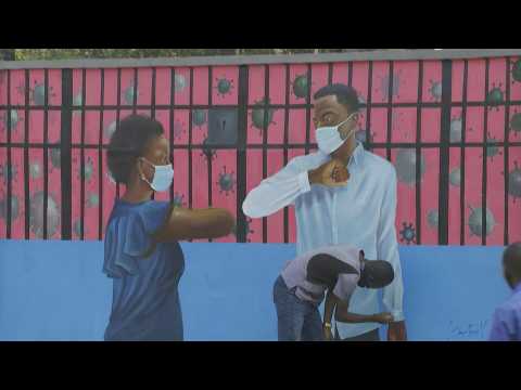 DR Congo: art students paint frescoes to raise awareness against COVID-19