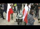 People rally against coronavirus restrictions in Warsaw