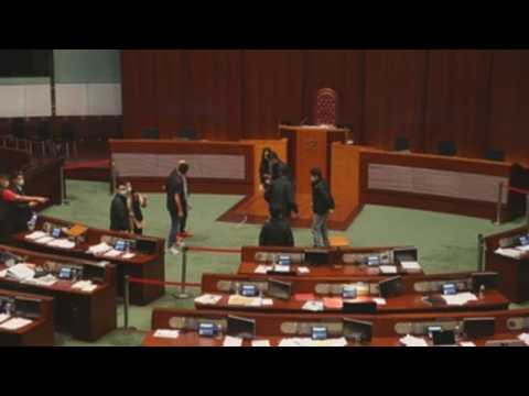 Hong Kong debate on Chinese anthem suspended after object thrown