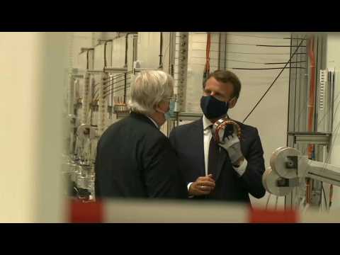 Macron visits car factory as France unveils plan to save auto industry