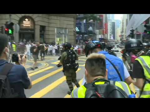 Hong Kong police fire pepper ball rounds at protesters