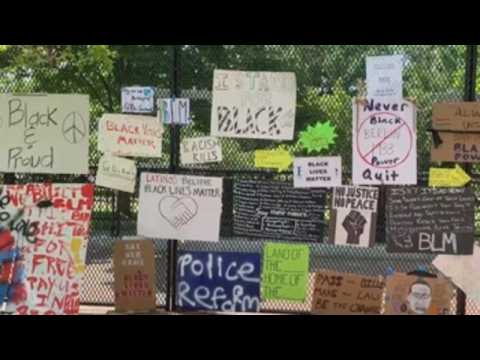 White House fence covered with messages of hope
