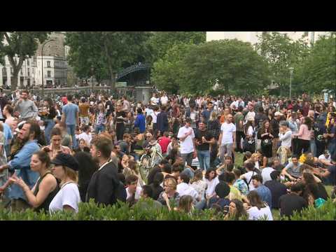 In Paris, crowds on the banks of the Canal Saint-Martin for the "Fête de la Musique"