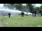 Dutch police use water cannon to disperse The Hague protest