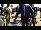 Malawi's President Mutharika votes in election re-run