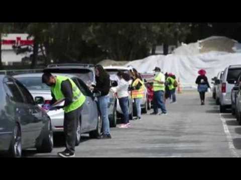 Drive-thru food distribution in California feeds families in need during COVID-19 crisis