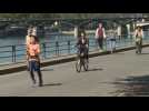 Paris joggers, cyclists return en masse to banks of the Seine