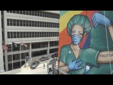 Italian artist paints mural at hospital in Miami to honor nurses
