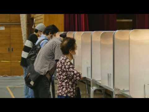 Tokyo votes in elections for new governor